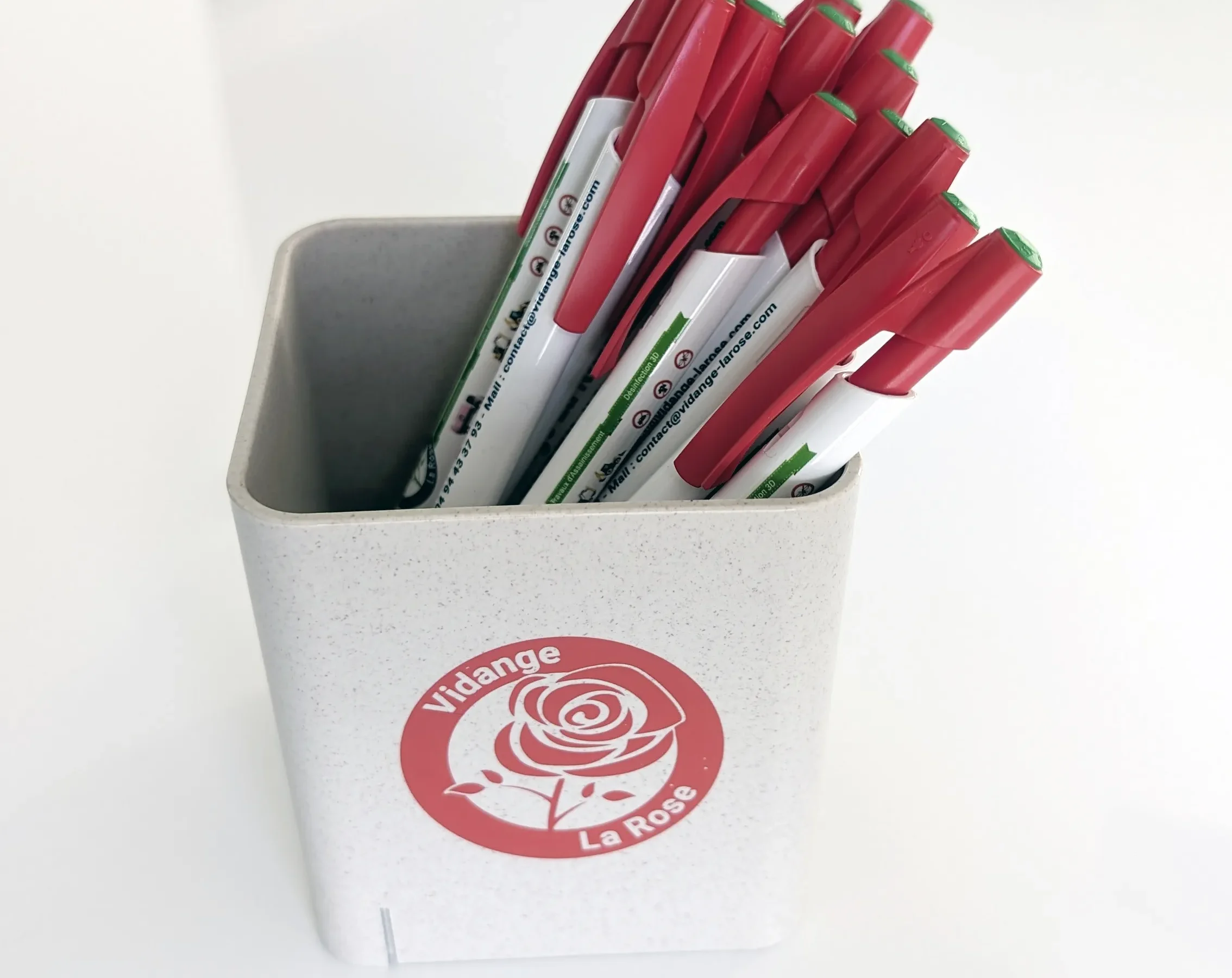 Stylos publicitaires Vidange La Rose avec porte-stylos chargeur à induction